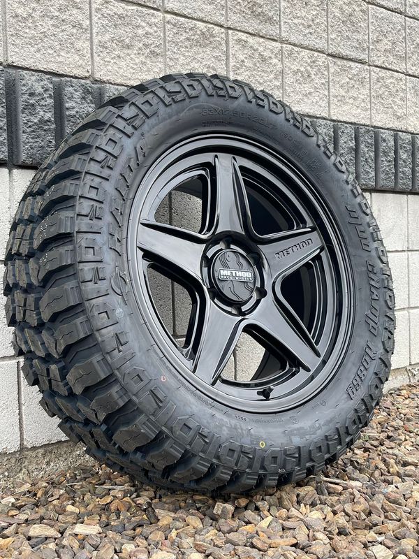 4 Wheel & Tire Method Race MR319 17x8.5  6x135 Gloss Black Wheels & 33x12.50-R17 Forceland Rebel Hawk Tires
