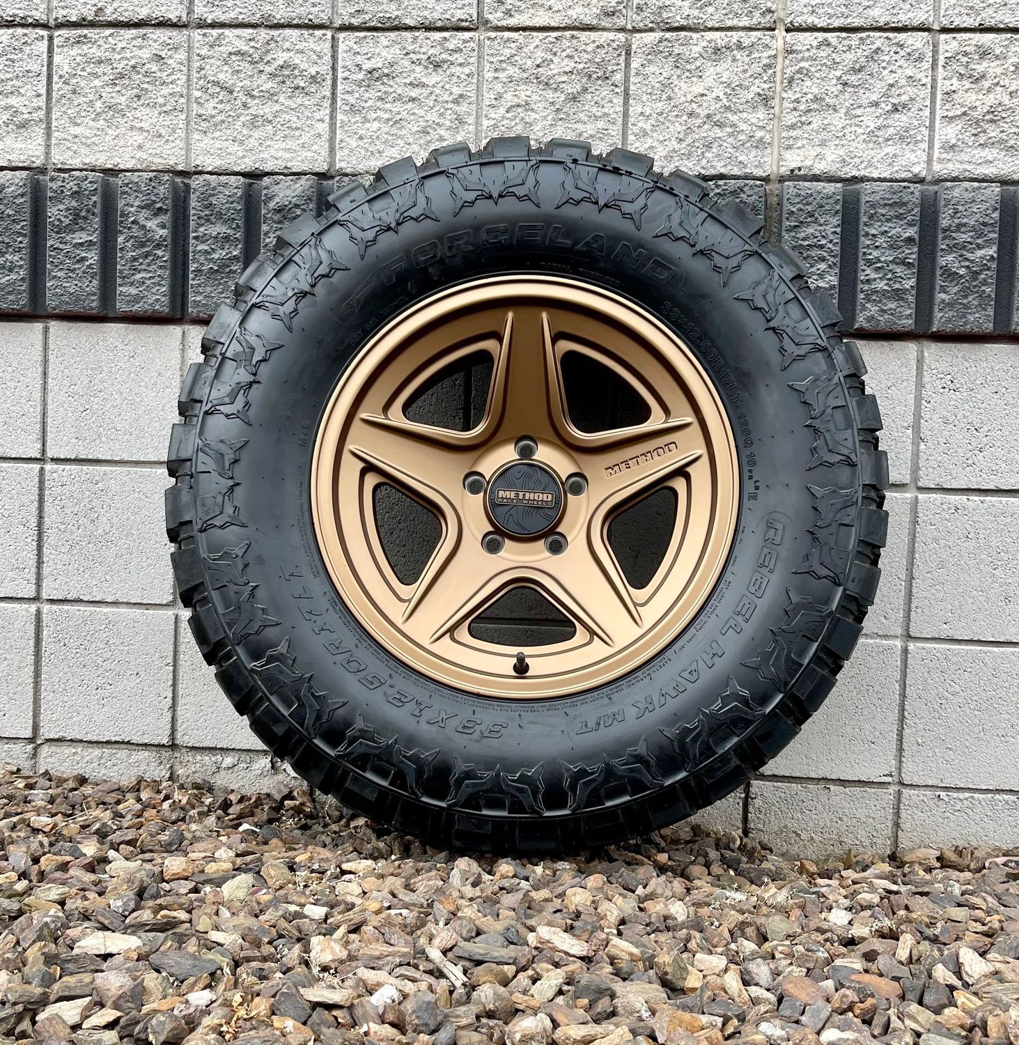 4 Wheel & Tire Method Race MR319 17x8.5 5x5.5 5x139.7 Bronze Wheels & 33x12.50-R17 Forceland Rebel Hawk Tires