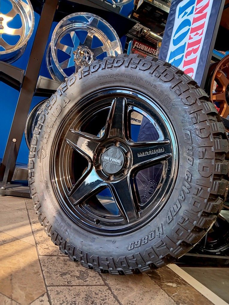 Wheel & Tire Method MR319 20x9 6X139.7 Gloss Black Wheels & 33x12.50R20 M/T Tires