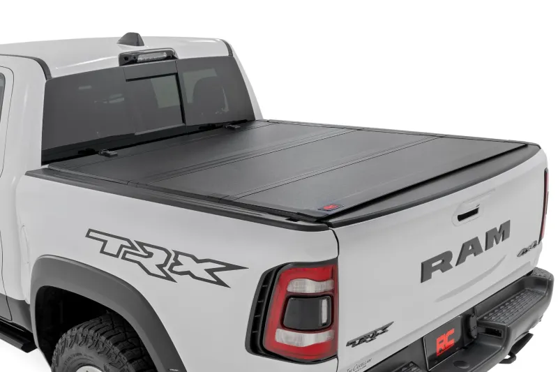 Rough Country Hard Tri-Fold Flip Up Bed Cover 5'7" Bed For 2019-2025 Ram 1500 TRX