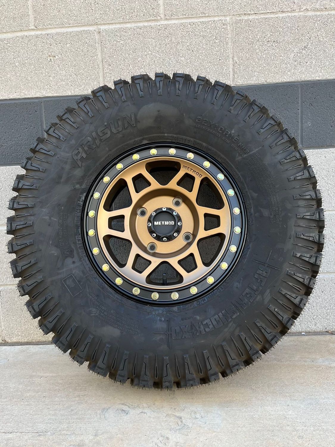 Method Race MR405 15X7 4x136 4x137 Beadlock Bronze Wheels & 33x9.5R15 Arisun Aftershock XD Tires FREE mounted
