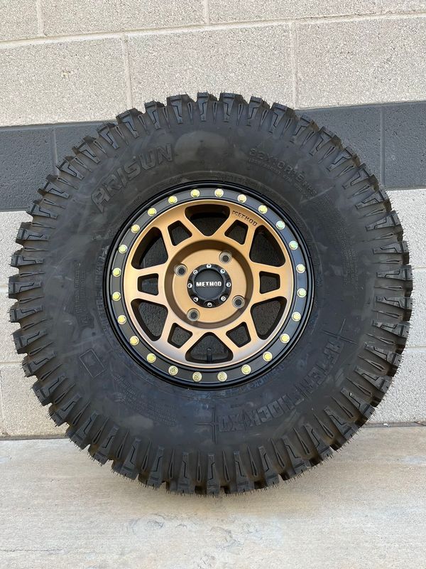 Method Race MR405 15X7 4x136 4x137 Beadlock Bronze Wheels & 33x9.5R15 Arisun Aftershock XD Tires FREE mounted