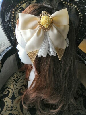 Ribbon hair accessory with rose