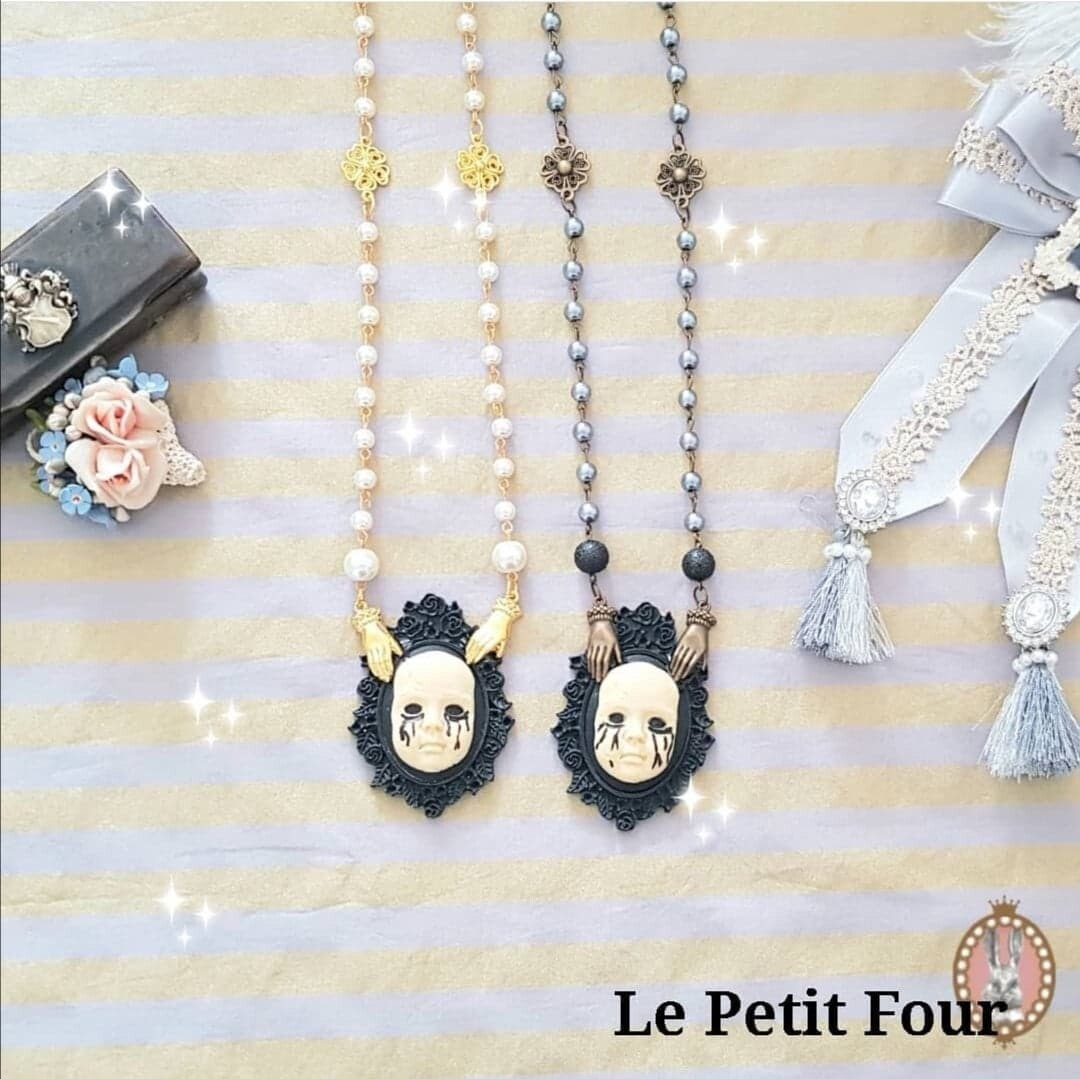 Scary Puppet necklace