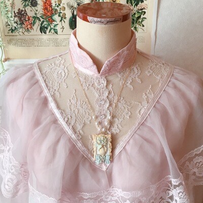 Painting of flower and butterfly necklace