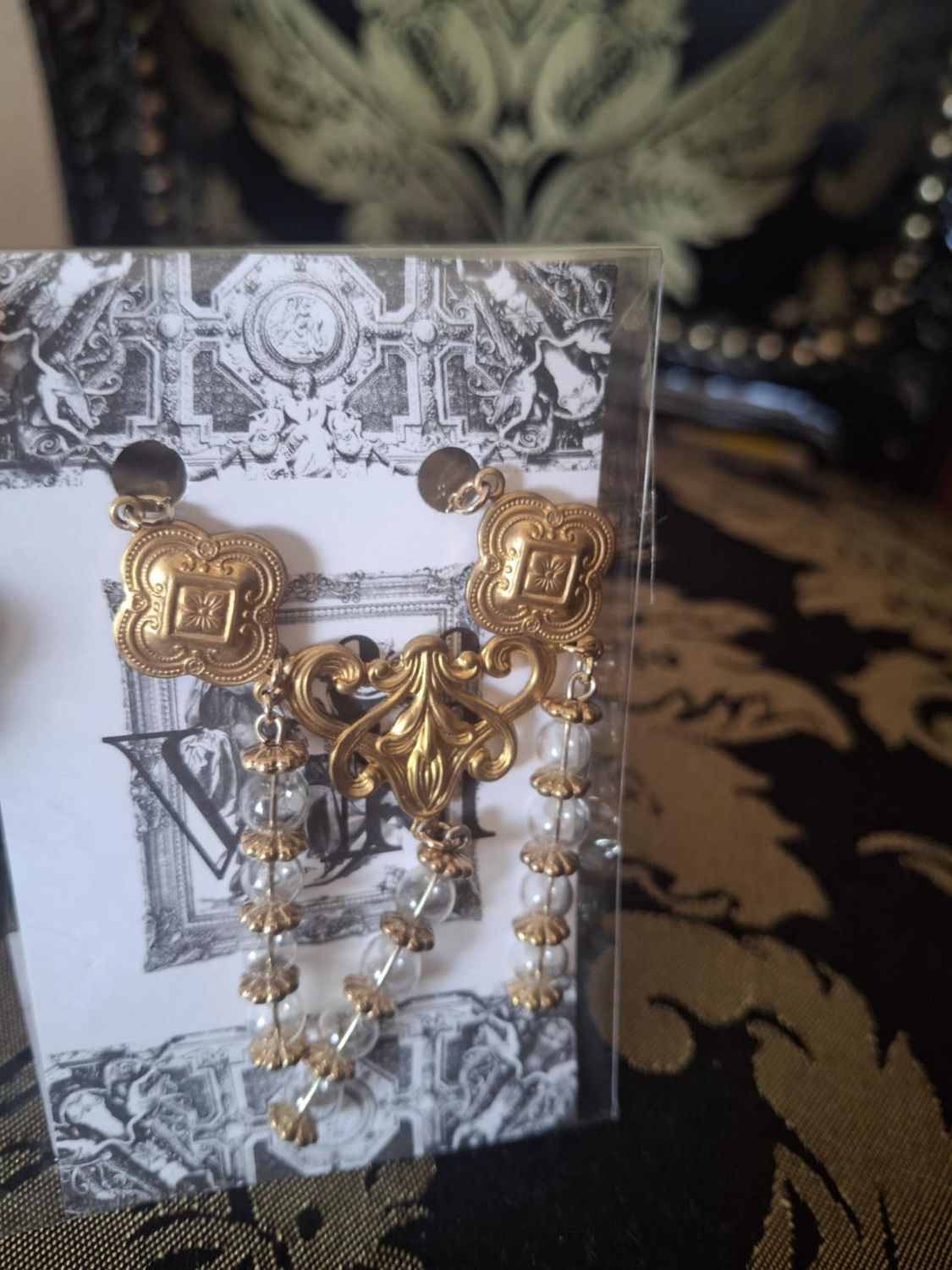 Antique beads and brass pendant