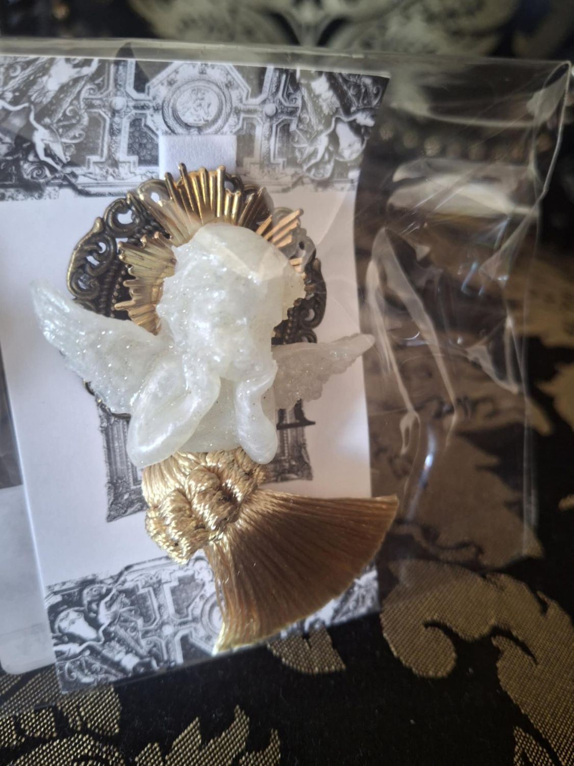 Tassel and Angel brooch