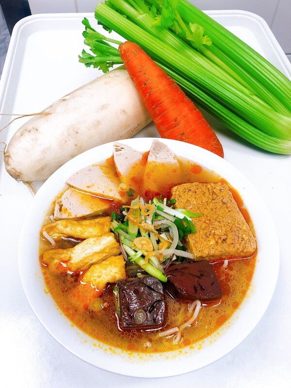212- Vietnamese Style Crab Meat, Tofu, Blood Pudding, Sausage, and Pork in vermicelli tomato soup