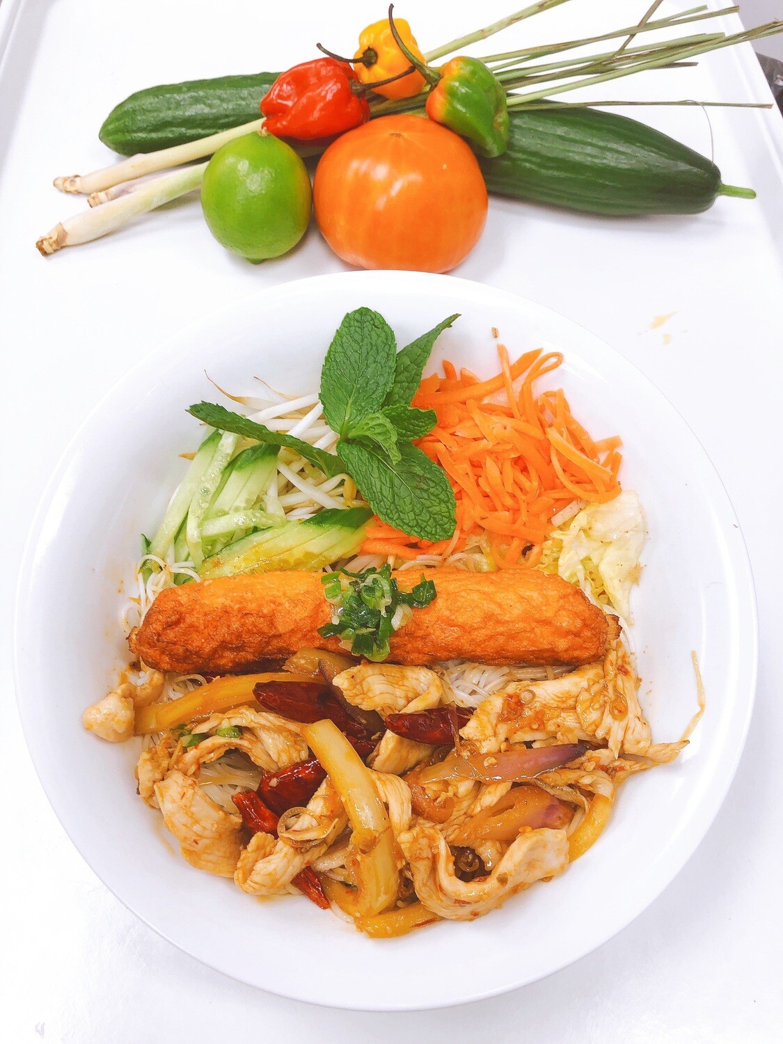 413- Stir Fried Chicken with Lemon Grass and Hot Pepper on Vermicelli (Plus One Item)