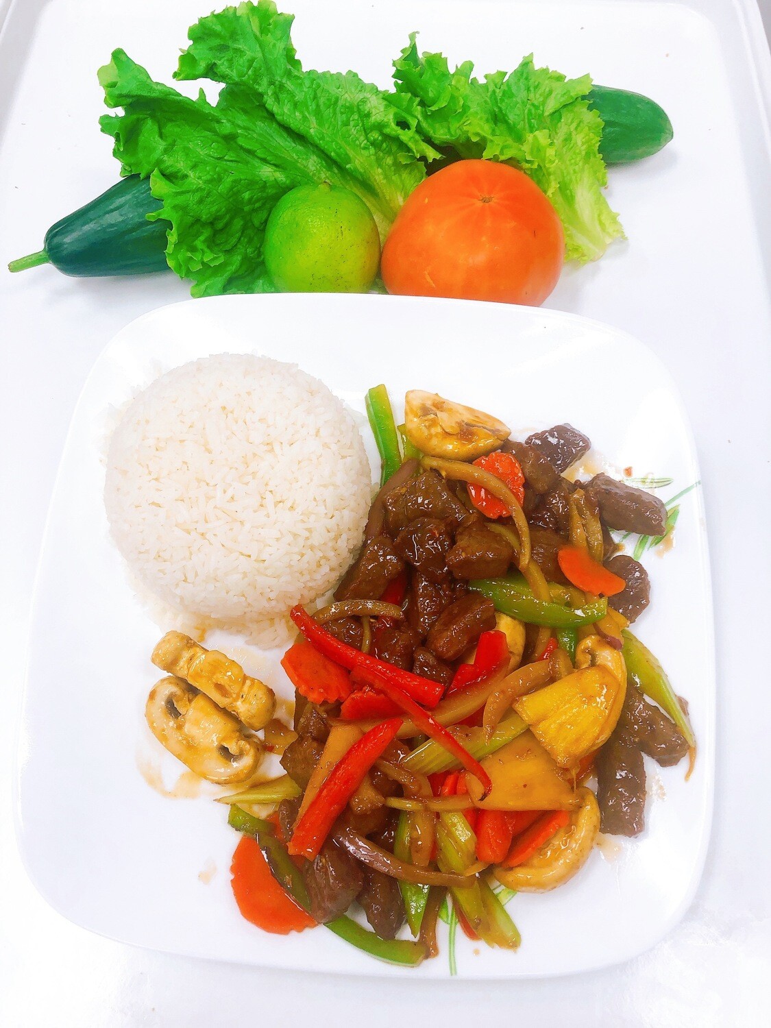 514- Sauteed Marinated Beef Cube on Steamed Rice