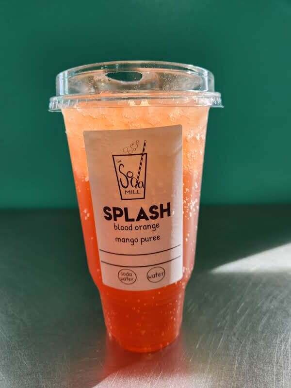 SPLASH - Sparkling or still water base with blood orange, and mango puree