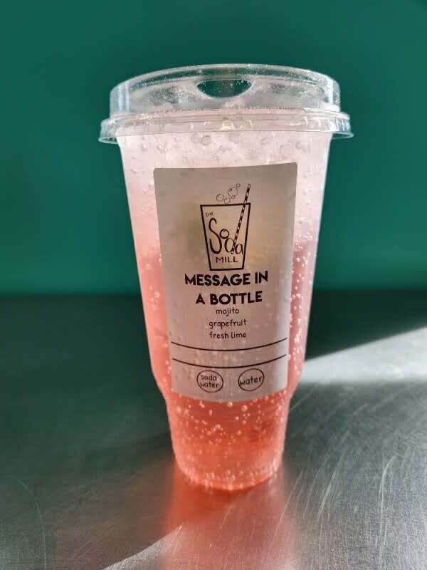 MESSAGE IN A BOTTLE - Sparkling or still water base with mojito, grapefruit, and fresh lime