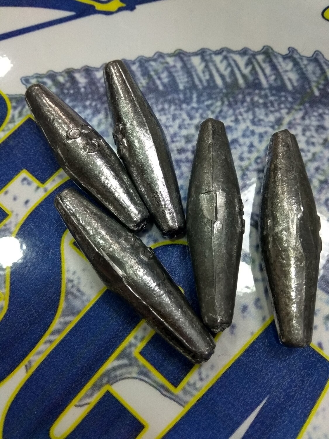 Plomo 85gr Oliva perforada