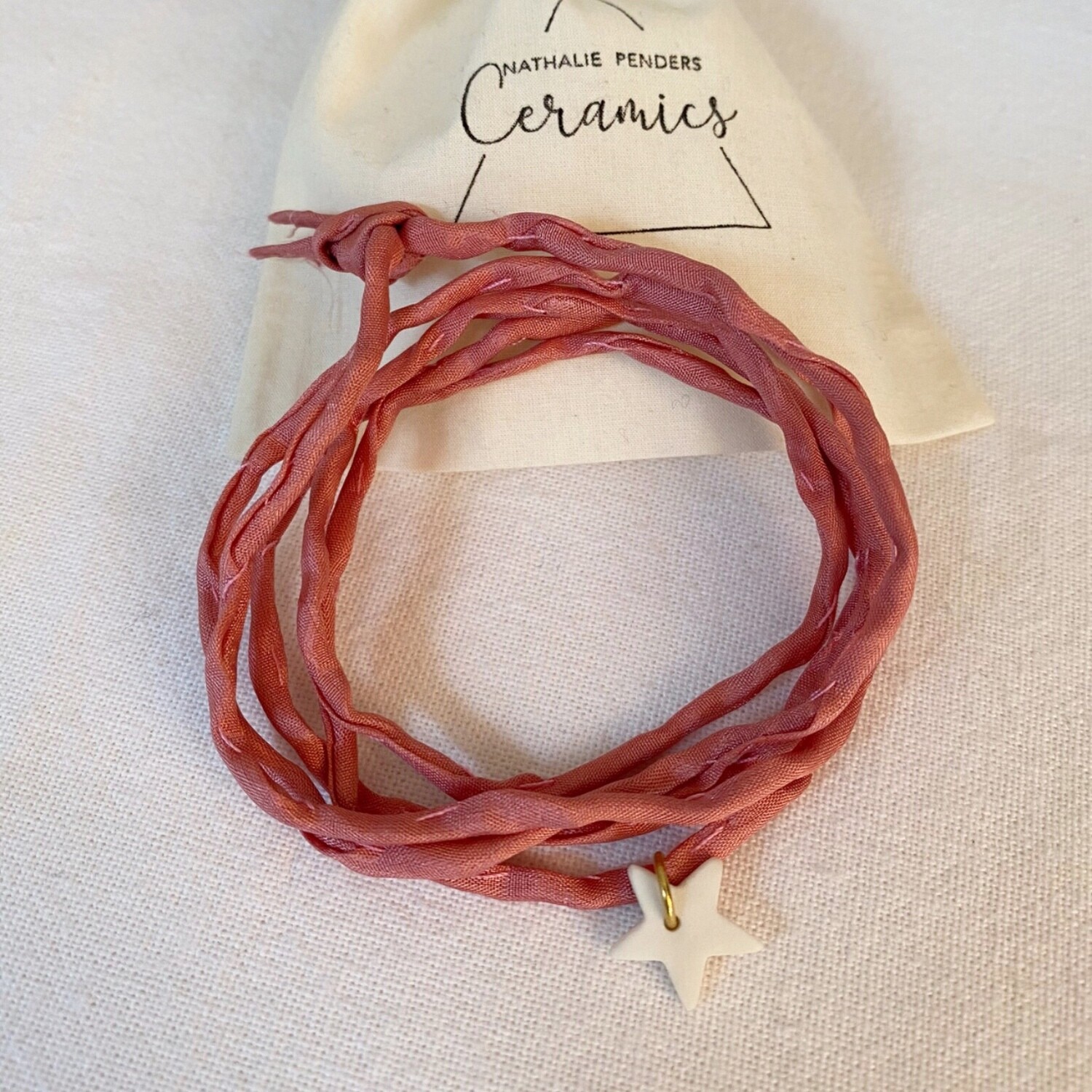 Bracelet soie rose étoile