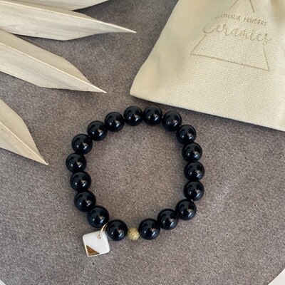 Bracelet grosses perles noires carré