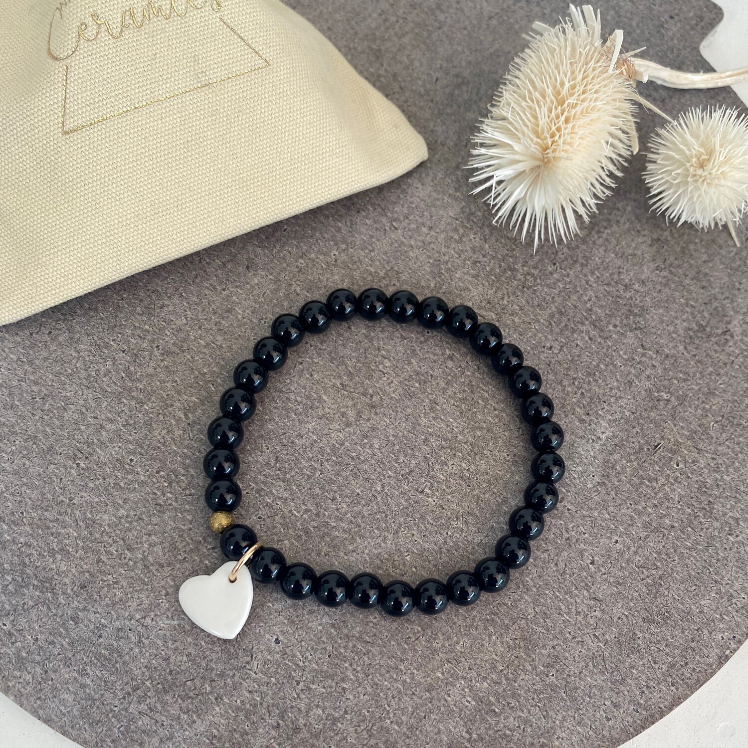 Bracelet perles noires coeur