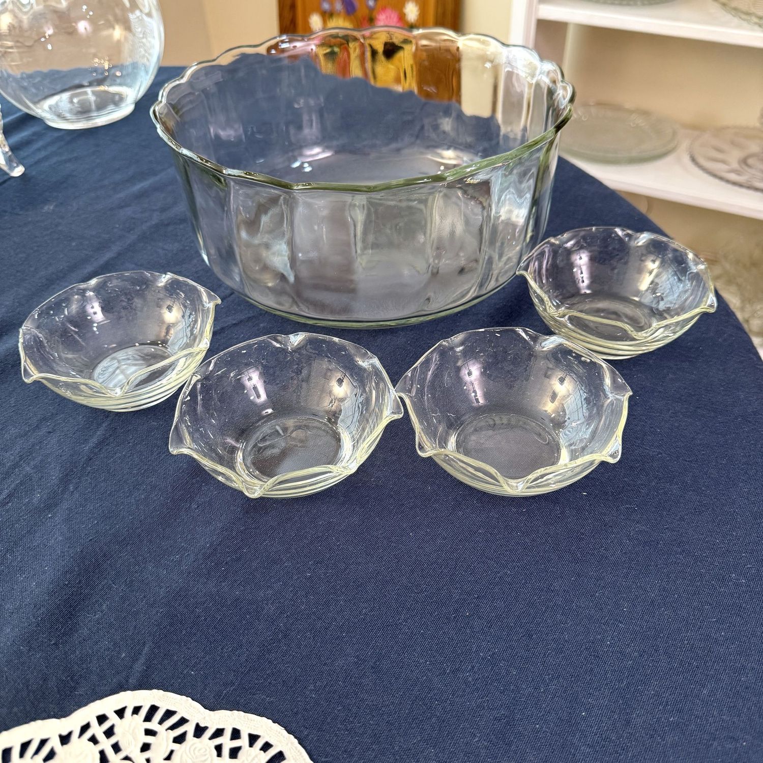 Clear glass scalloped bowl 10"W  and small serving bowls