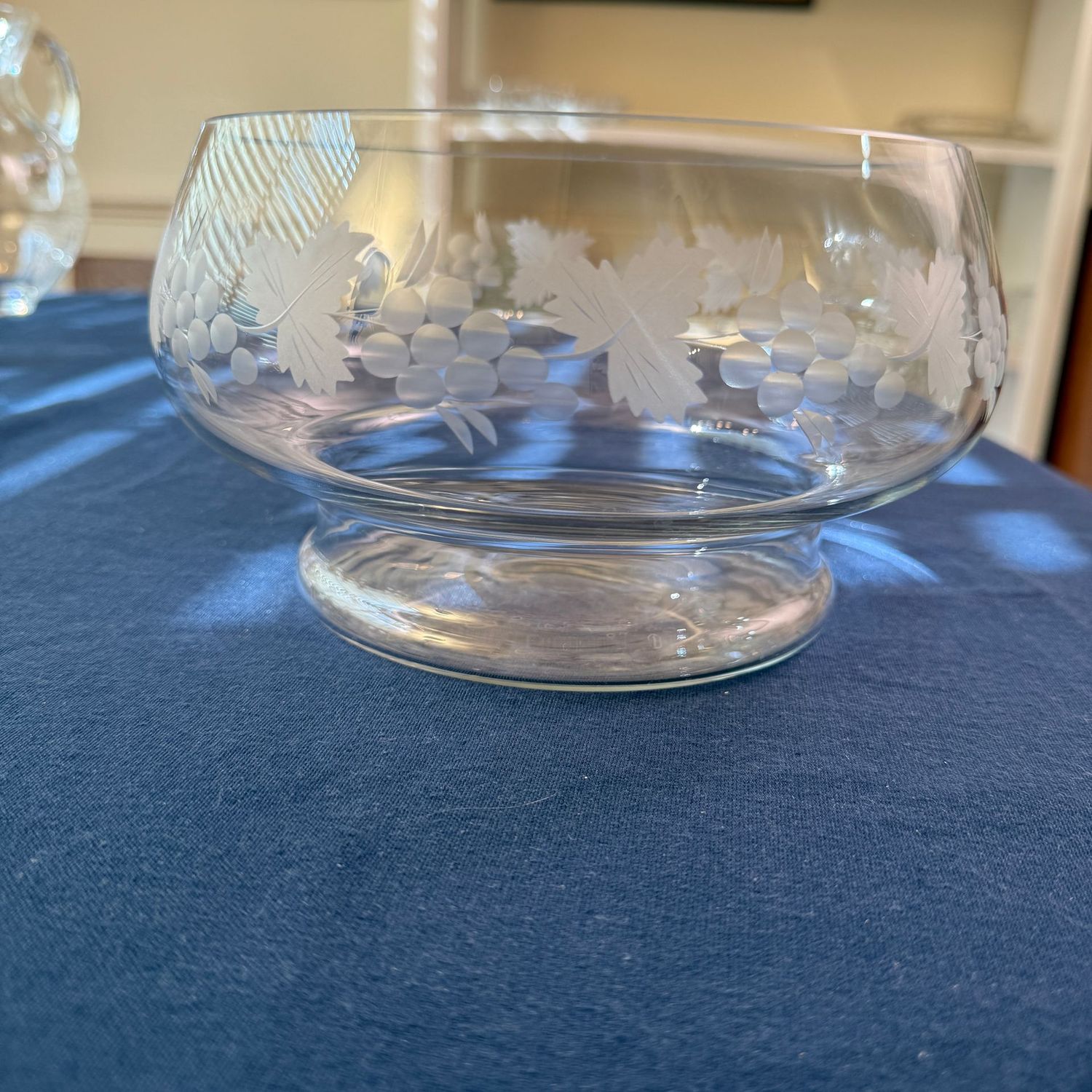 Clear glass bowl with grapes and leaf-etched sides 8.5"W