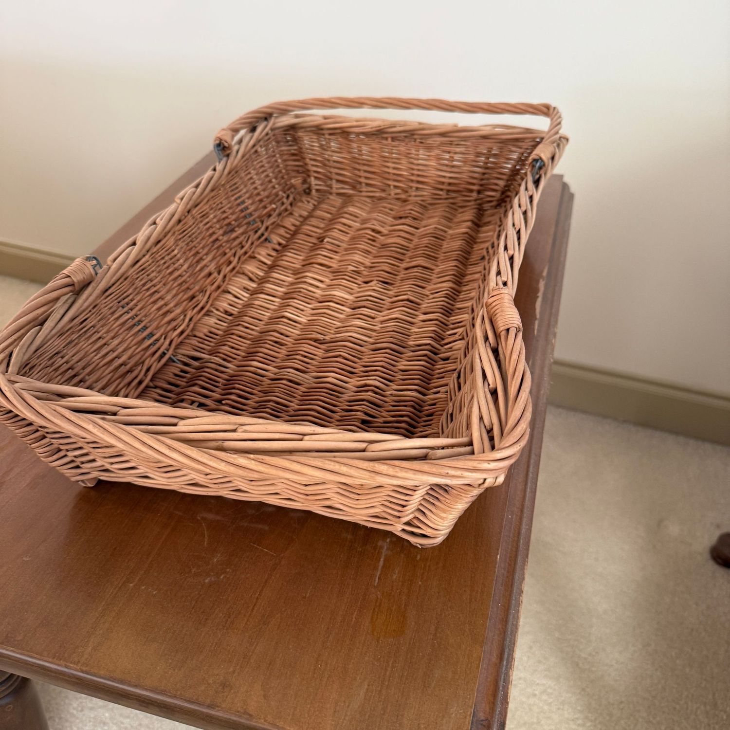 Double-handled rectangular basket, some wear 18"L x 13"W