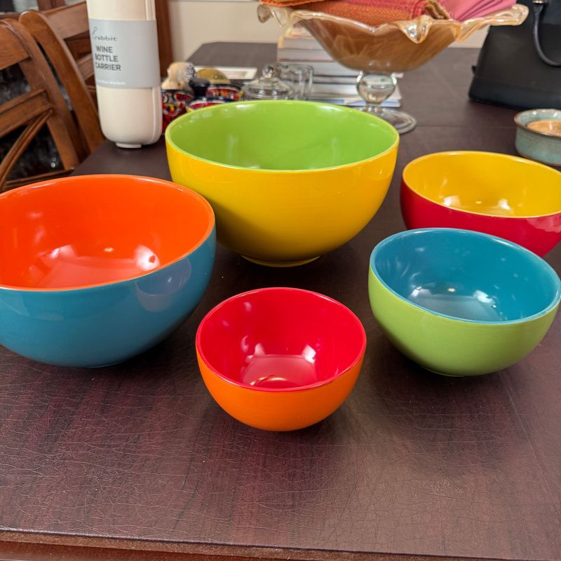 SCM Designs stoneware brightly colored nesting bowls, the large yellow 10 SCM Designs stoneware brightly colored nesting bowls, the large yellow 10" bowl has a crack on base (value of set is based on the other bowls)