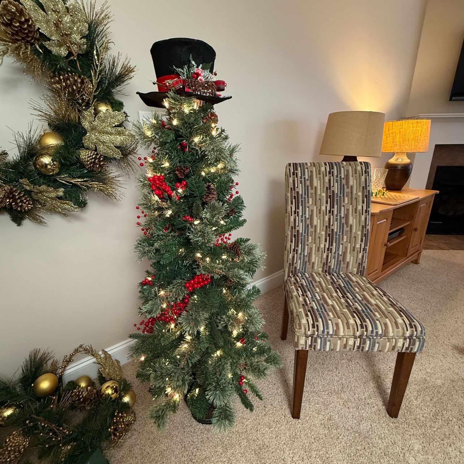 Christmas tree with lights, berries and snowman hat, plastic planter base 52"H