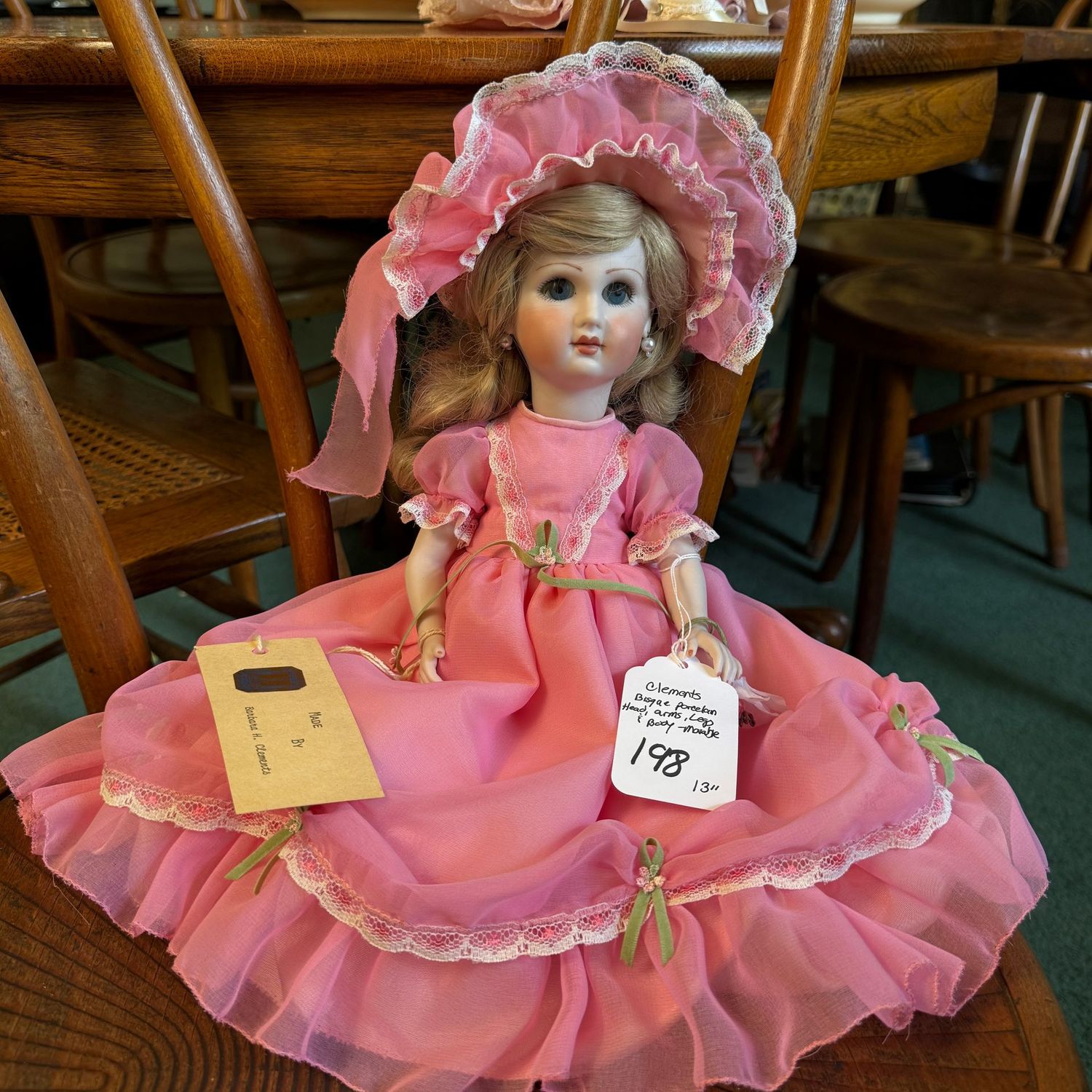 #198 Clements handmade doll, bisque porcelain head, arms, legs & body, moveable, pink dress, 13"