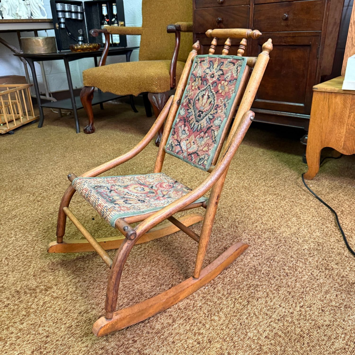 Victorian child's bentwood rocker with woven carpet back and seat 32"H x 13"W