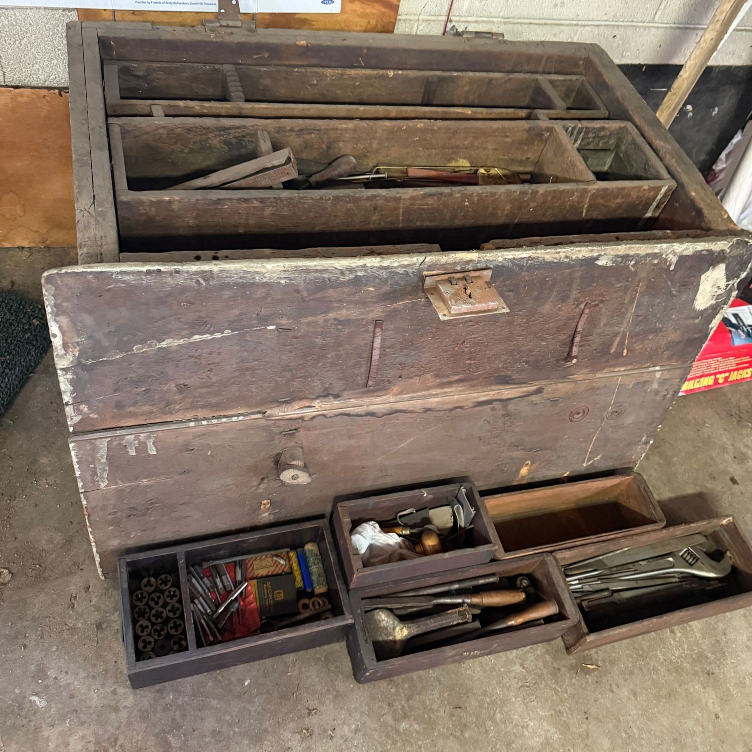 Very large, heavy tool storage chest on casters ca. 1940, has multiple removable compartments, lid is detached but has hinges 22"H x 42"W x 24"H