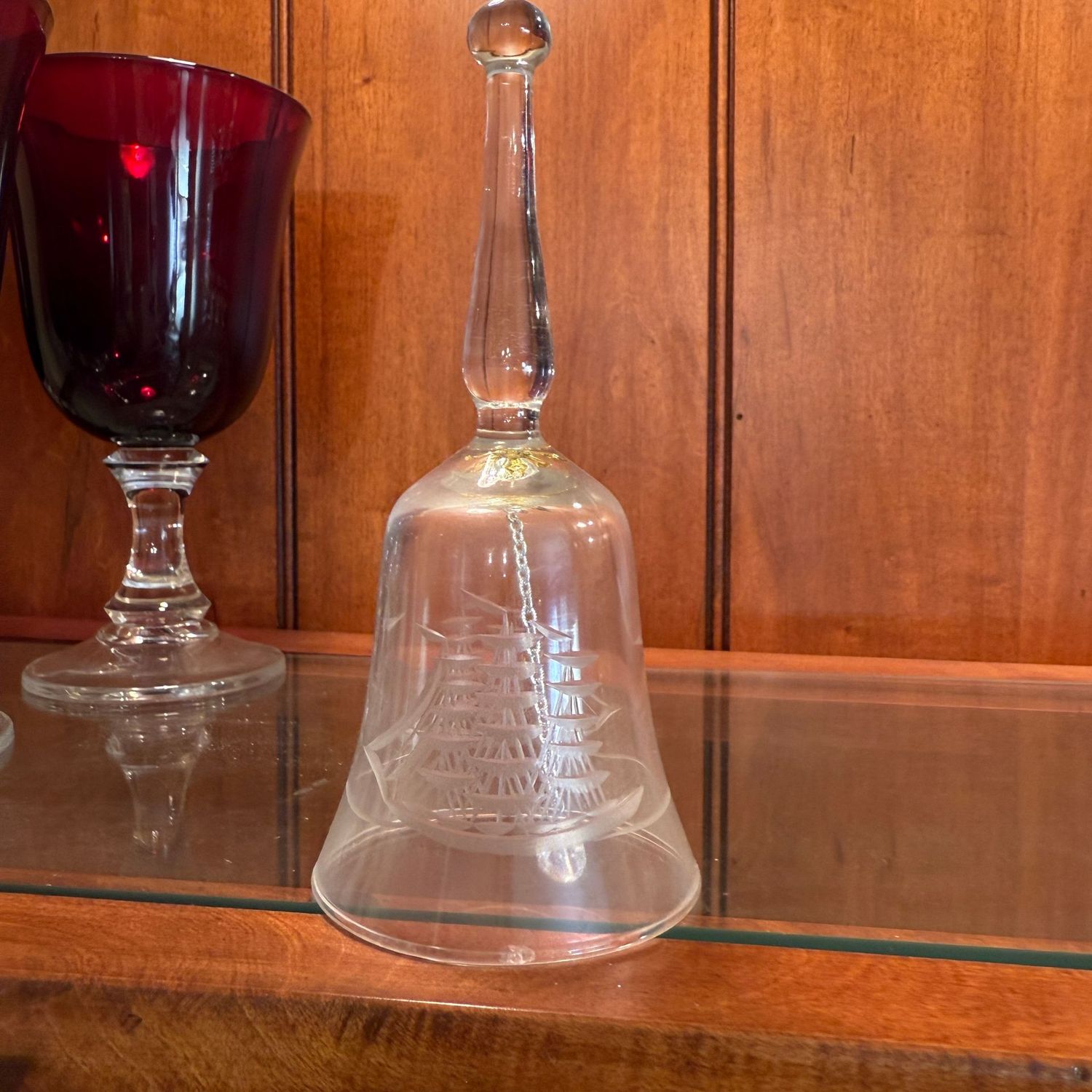 Clear glass bell with etched clipper ship 6"H