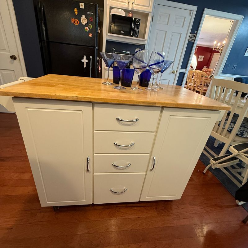 Kitchen island/bar some wear and scratches, lift-up side, on casters 36"H x 23"W x 54"L