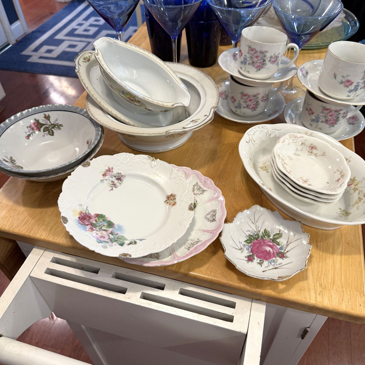 Group of porcelain dishware with roses and flowers including from Germany, Austria