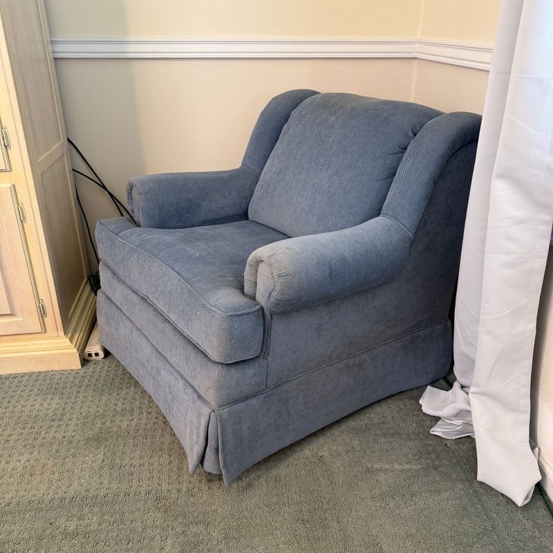 Large swivel and rocking blue chair, comfortable, needs cleaned 34"H x 38"D x 32"W