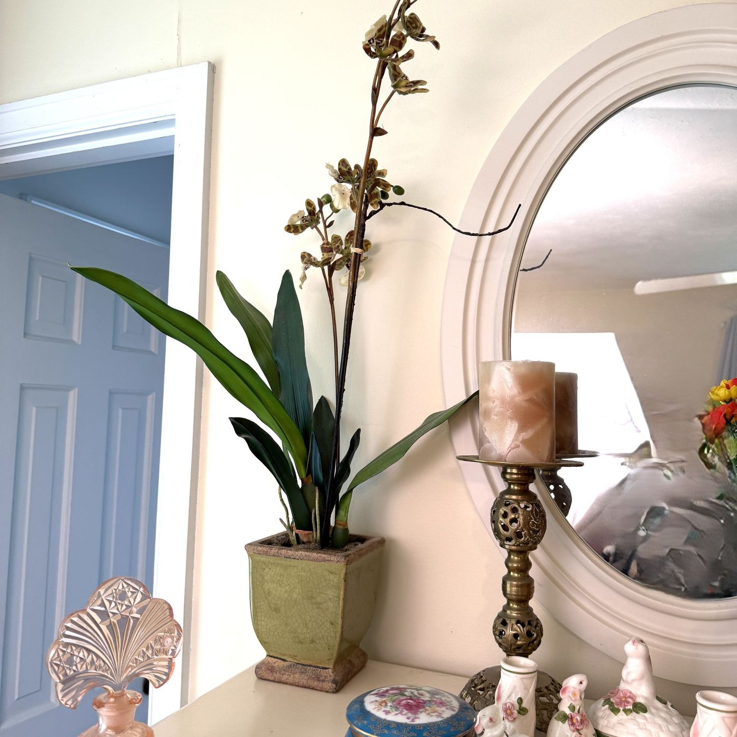 Tall faux flower in green planter 28"H