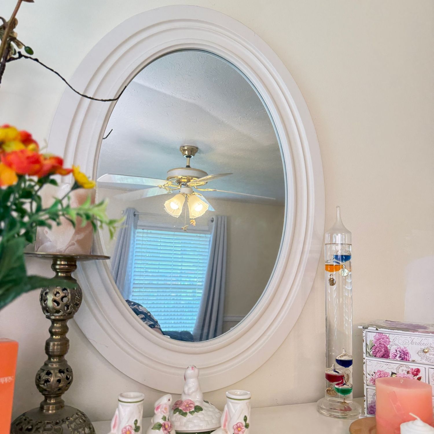 White wooden oval mirror 27" x 20"
