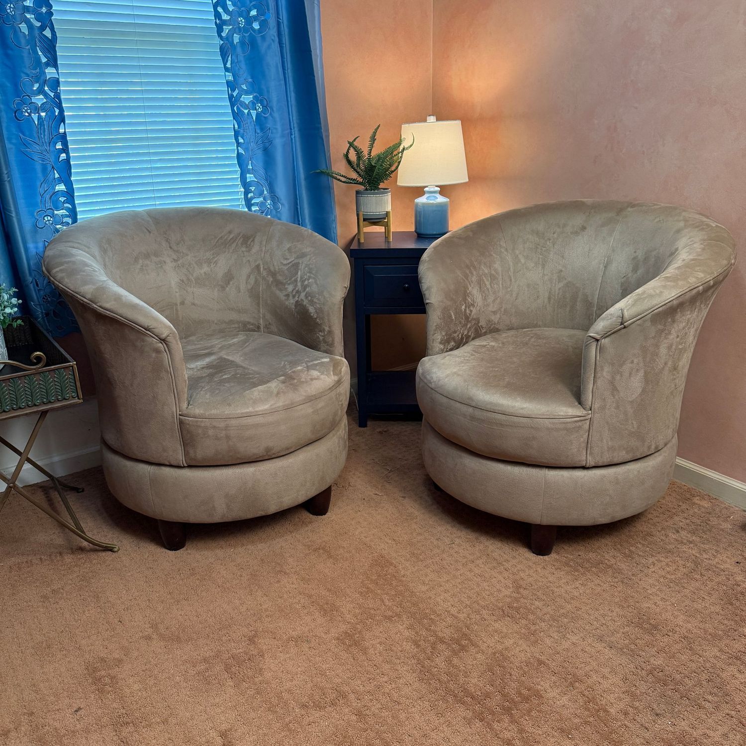 Pair of microsuede tan swivel club chairs, mild wear 33"H x 32"W