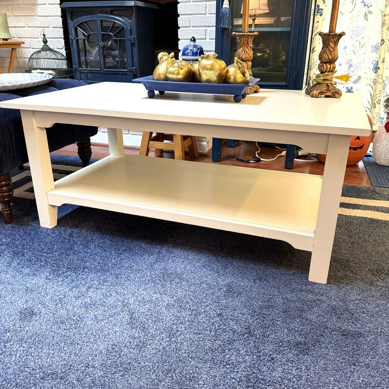 White laminate coffee table 18 White laminate coffee table 18"H x 23"W x 40"L