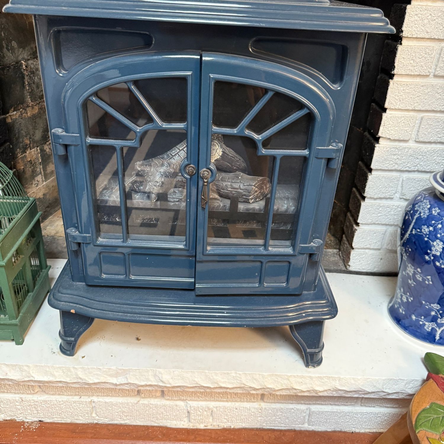 Muskoka electric heater, blue laminate on most of the surface, some wear, one drop handle missing, works well 25"H x 20"W x 14"D