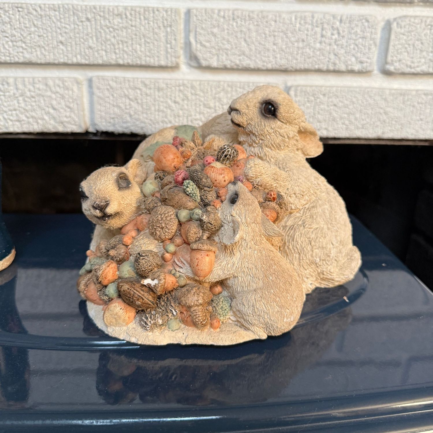 Large heavy resin pile of rabbits and fall nuts 6" x 8"