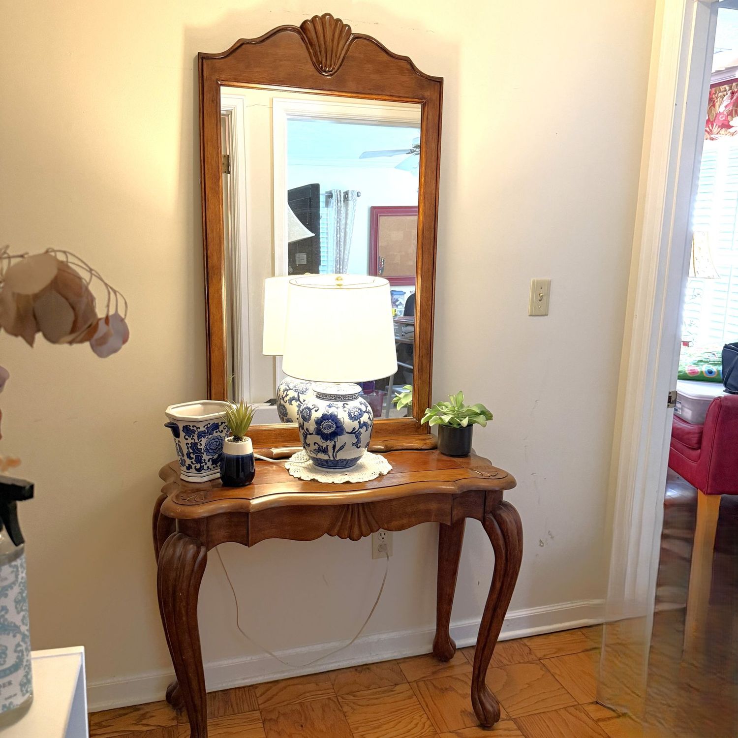French country-style hall table 36"W x 16"D x 27"H and mirror with shell/fan design, mirror can be lifted to hang on wall 46"H