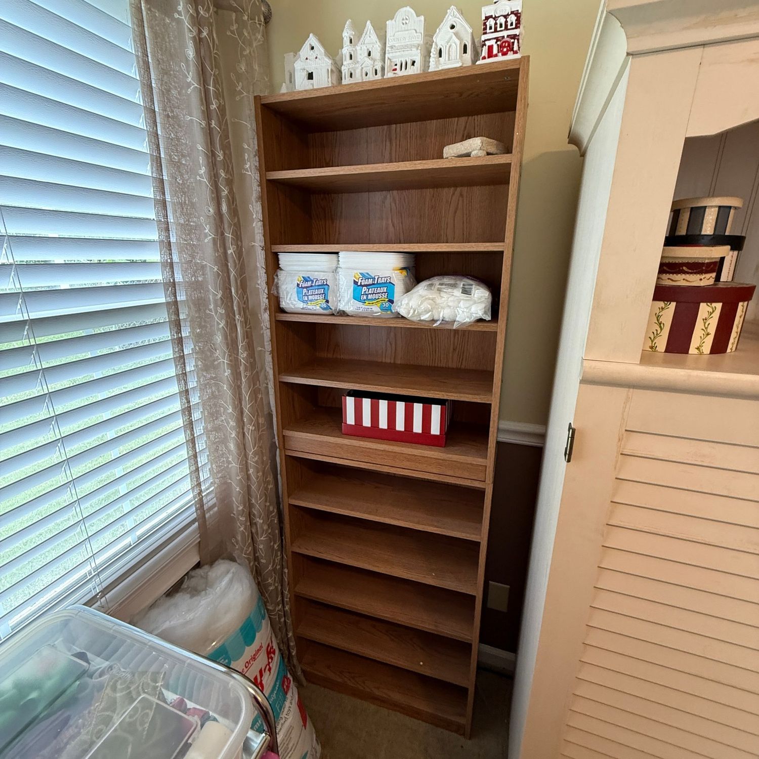 Two stacked laminate shelves, some adjustable shelves, each unit is 30"H x 22"W x 8.5"D