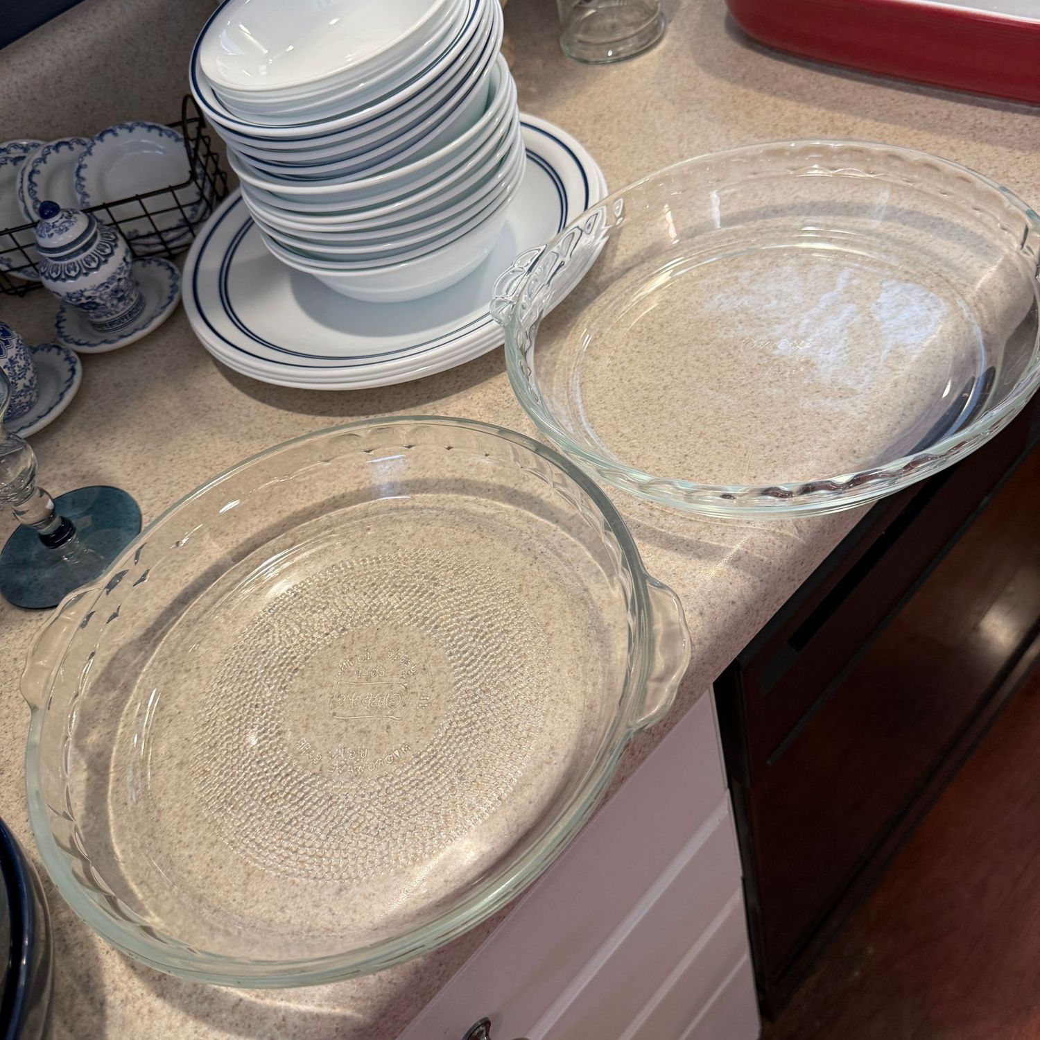 Two clear glass pie dishes