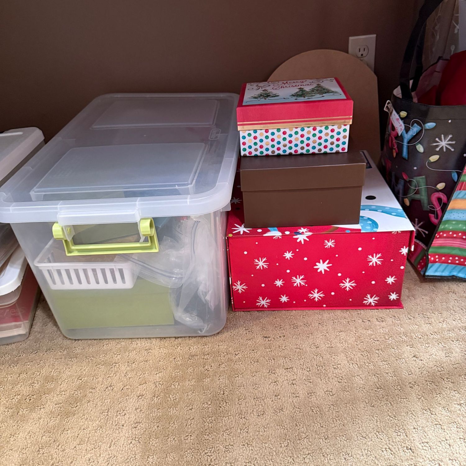 Large plastic bin of Christmas boxes, wrapping, pressboard box, gift bags