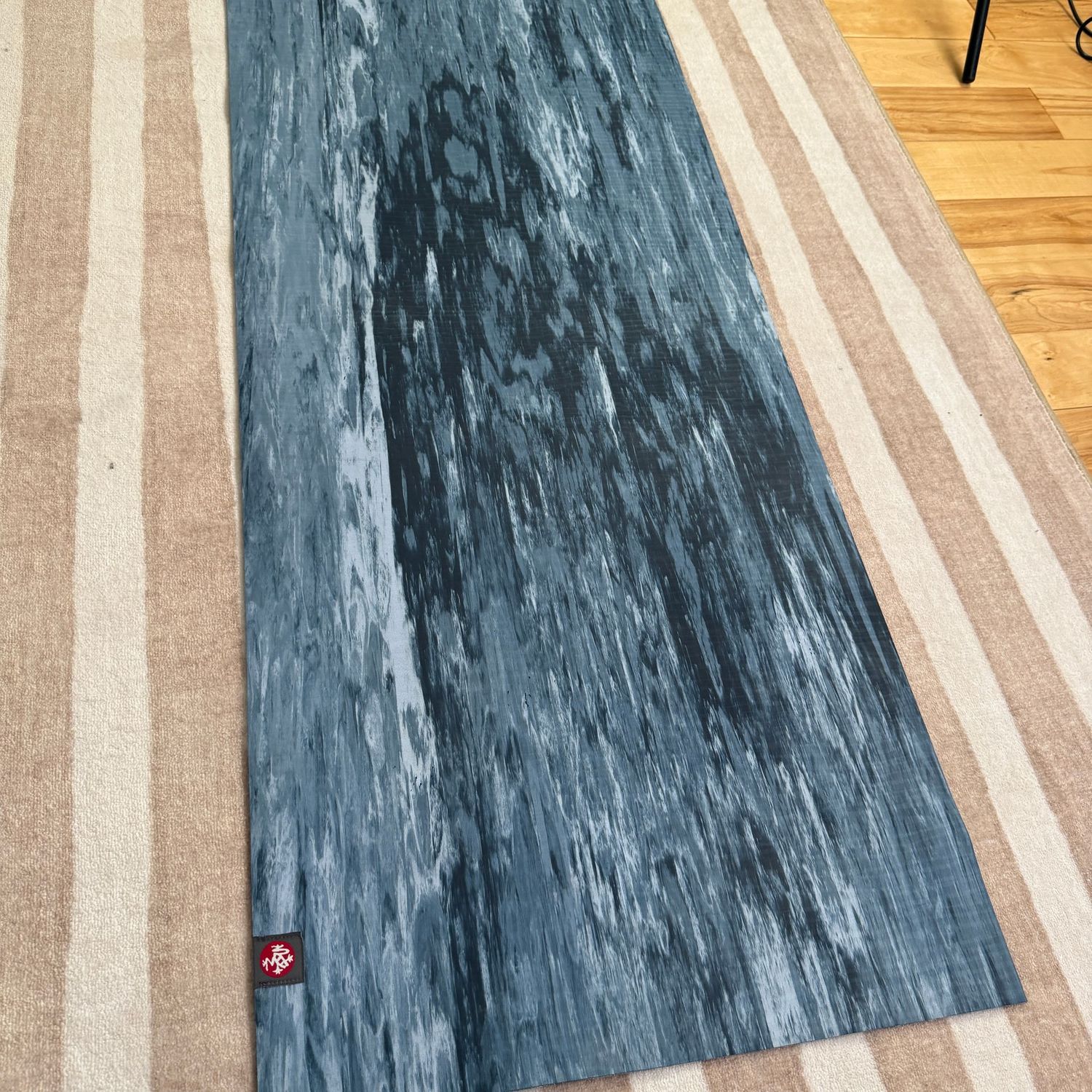 Manduka eKO yoga mat, multi-color blue, has minor wear