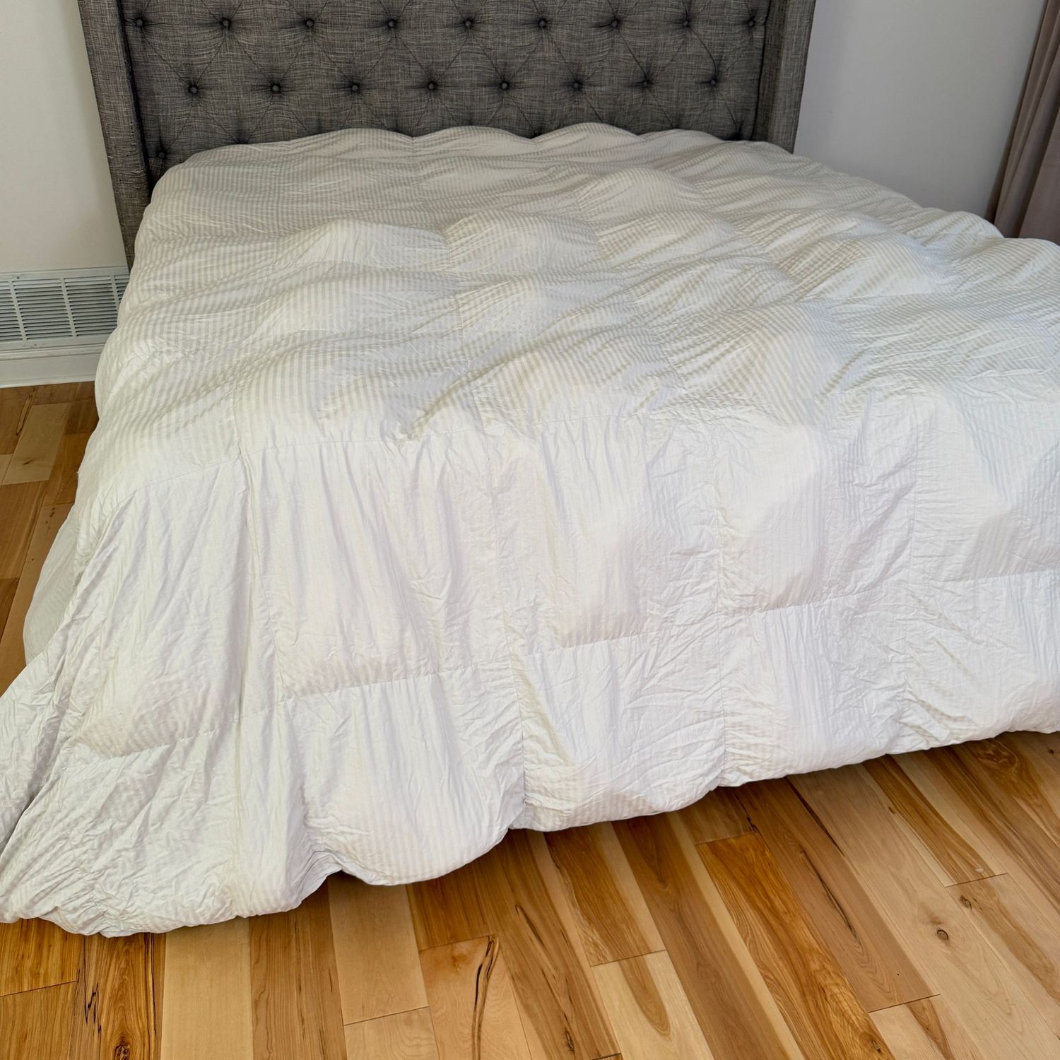 King-size comforter, cream stripe, downlite 100% polyester fill (has become lumpy in squares, but might be fixable)