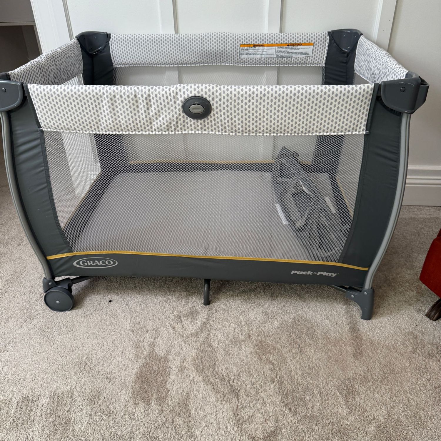 Graco Pack ' n Play grey and white, assembles easily, floor becomes travel cover, clean & nice
