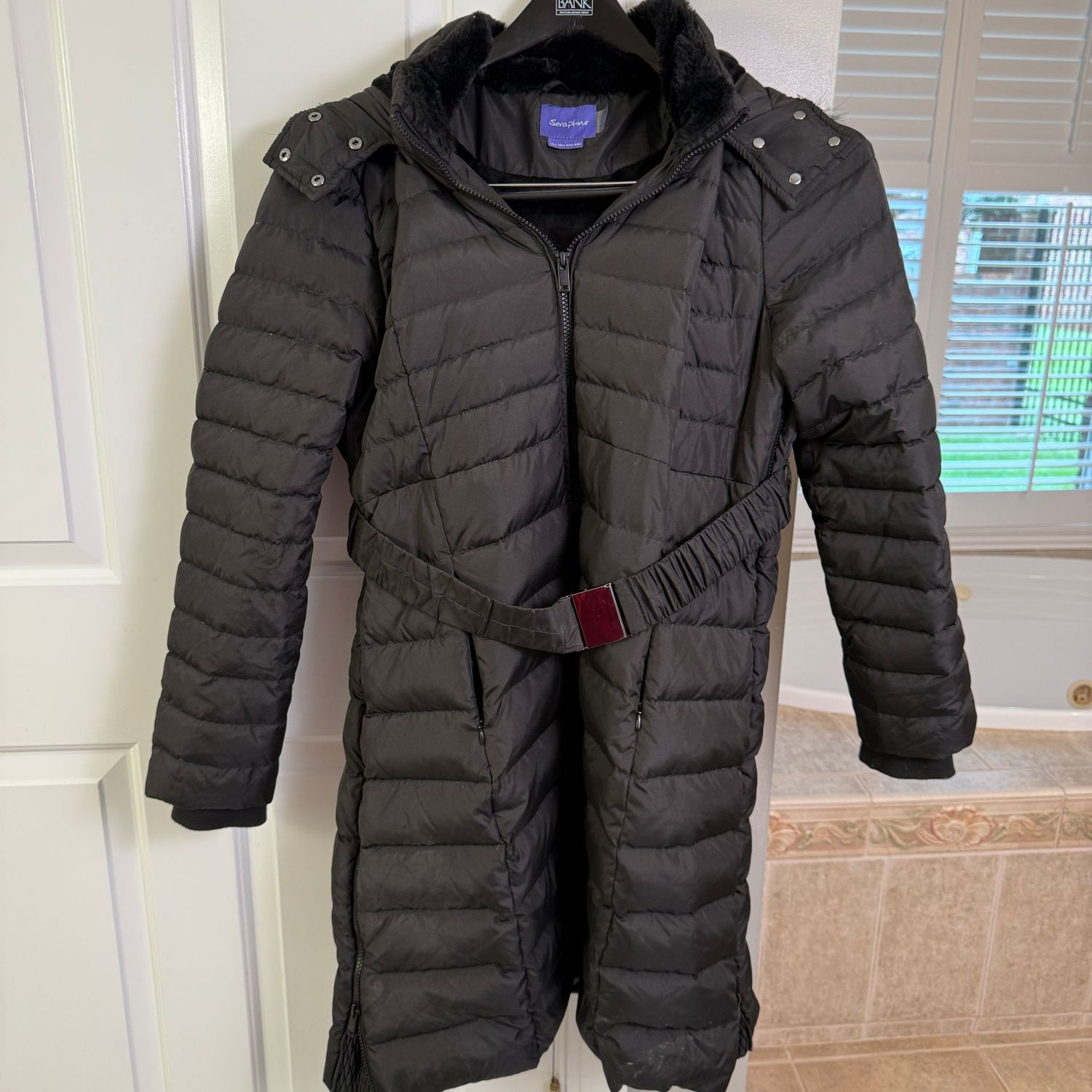 Seraphine insulated coat, both sides have zippers plus front, hooded, approx, mid-thigh length size 10