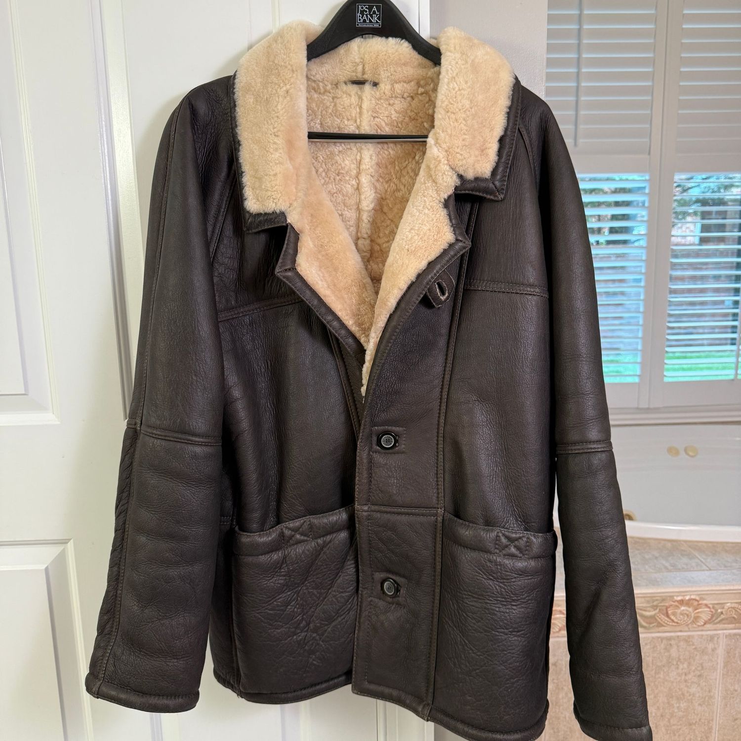 Calamar Manner Leather and Sheepskin coat, a roomy XL or size 52, nice condition, has a 32"L shoulder-to-hem