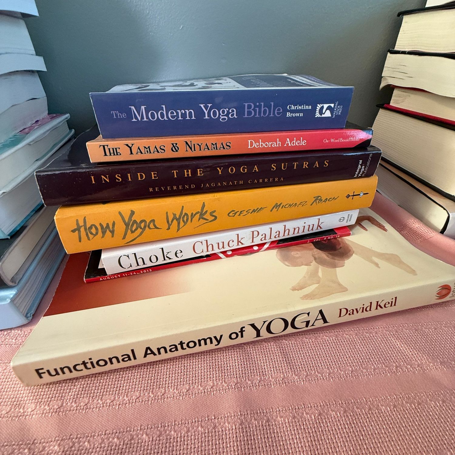 Group of books including Modern Yoga and How Yoga Works