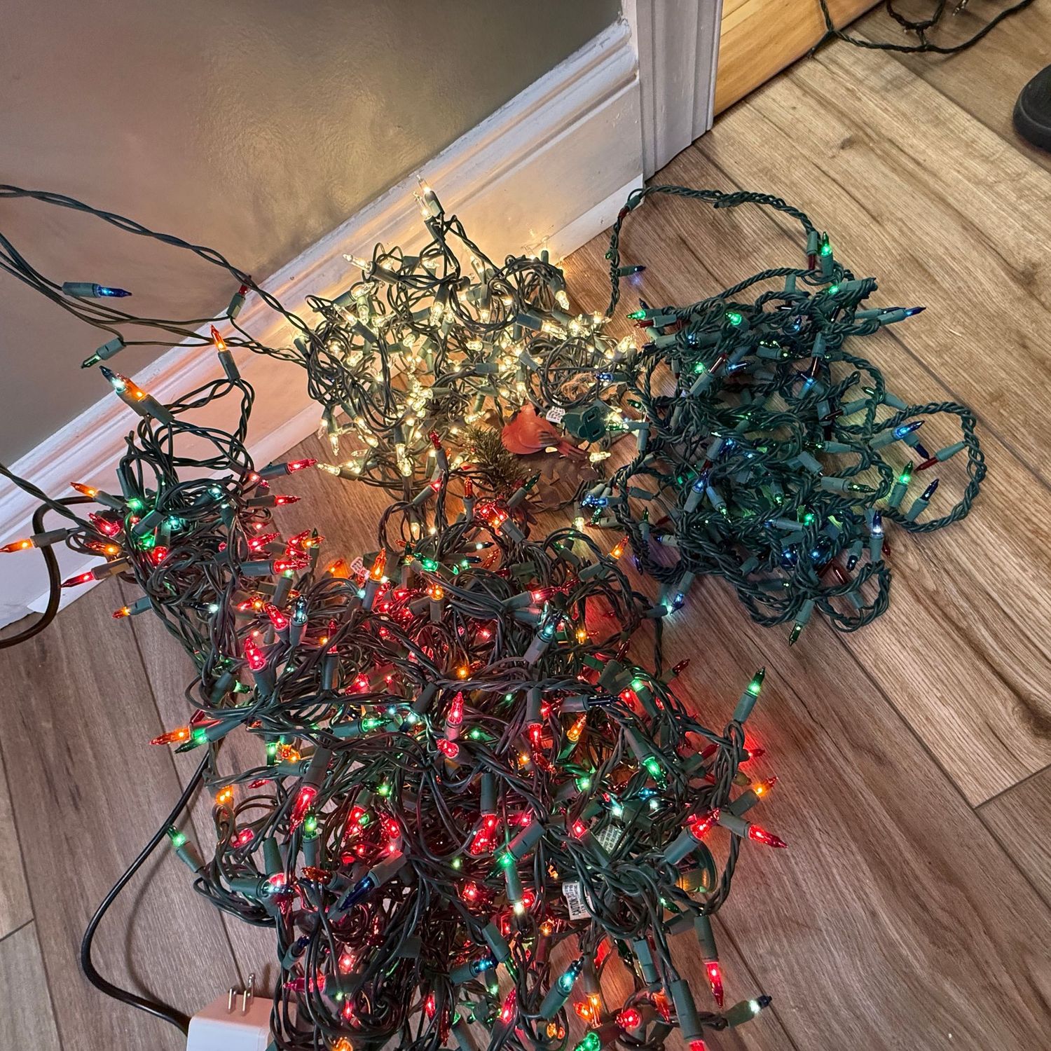 White clothes basket of Christmas lights, working