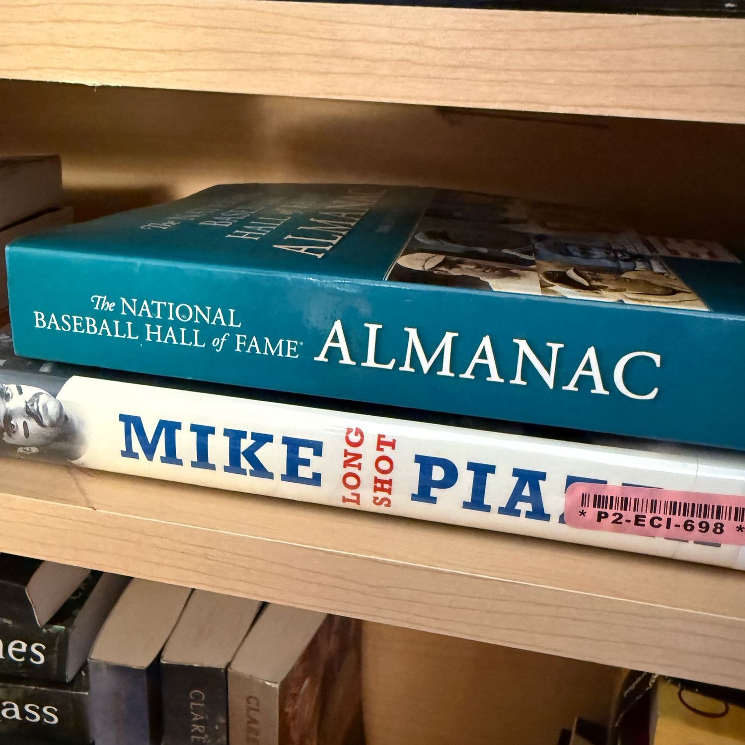 Group of books including National Baseball Hall of Fame Almanac